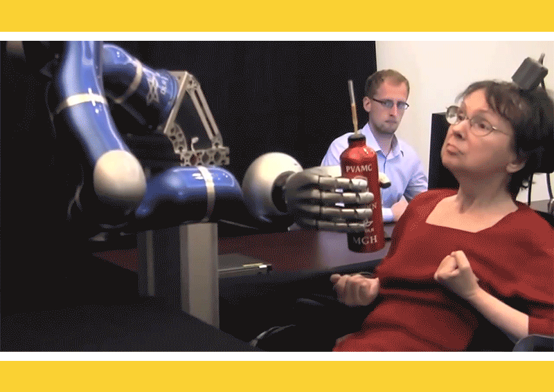 A gif of a robot feeding a woman through a straw in a bottle